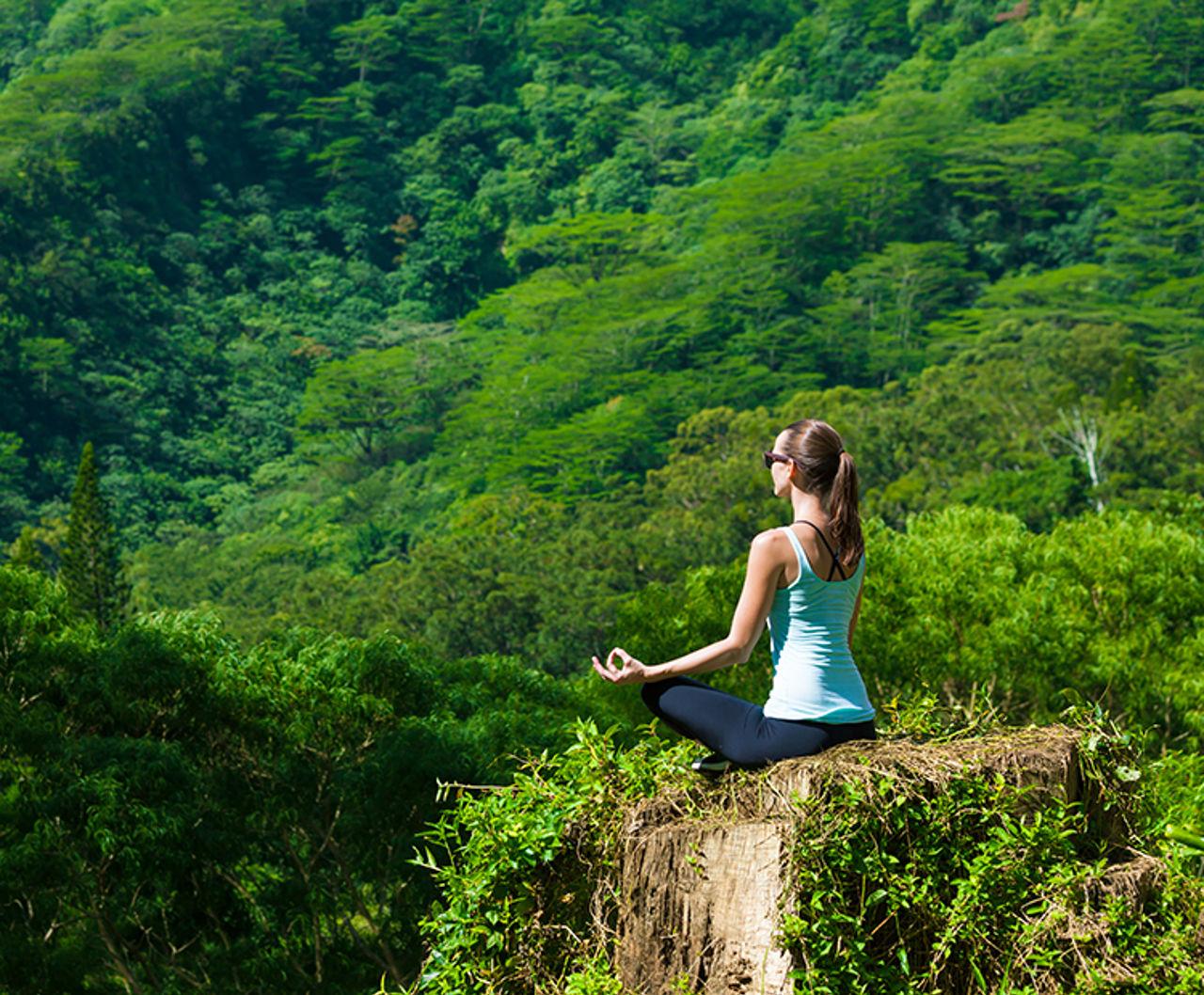 Woman doing yoga in nature